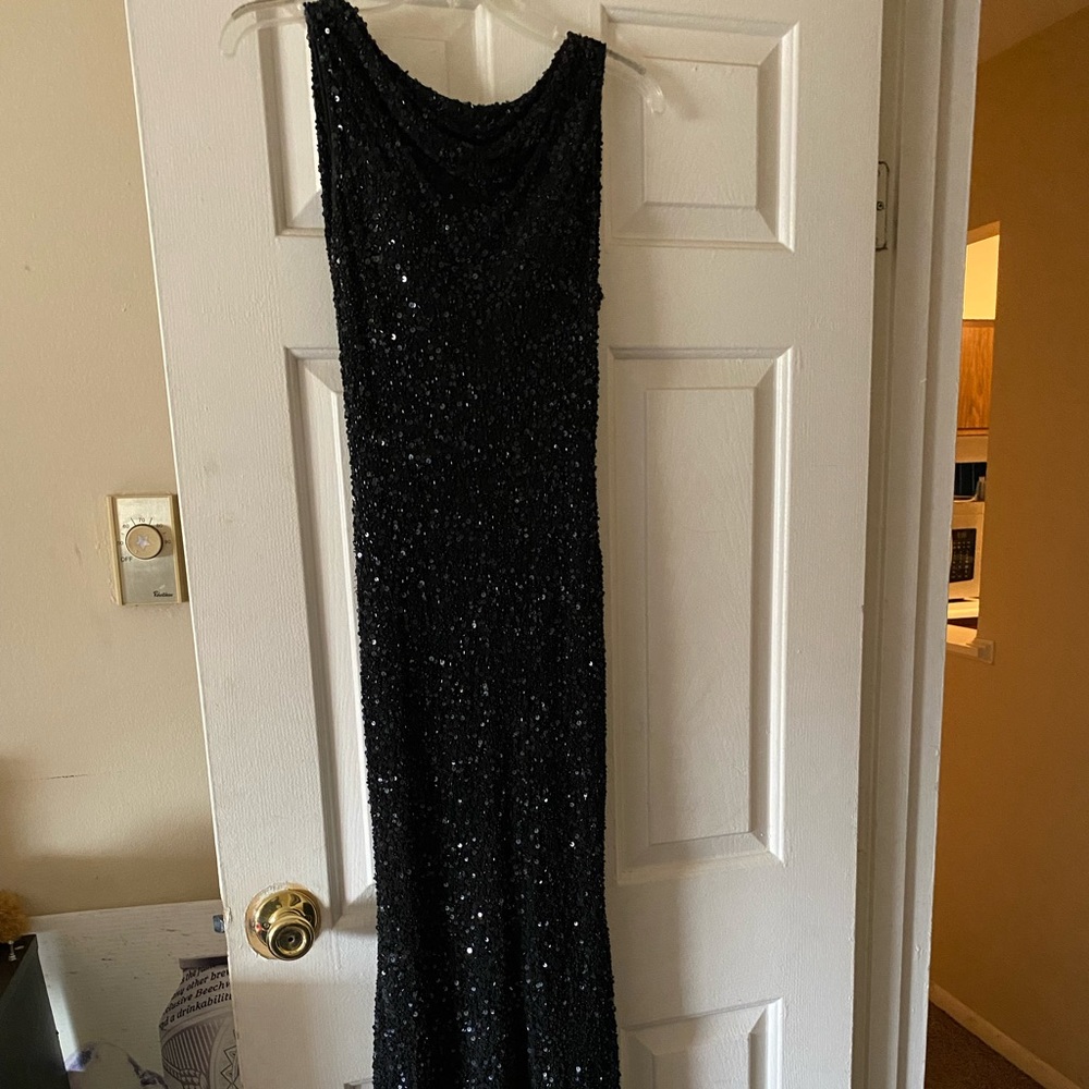 Long, open back, tight dress